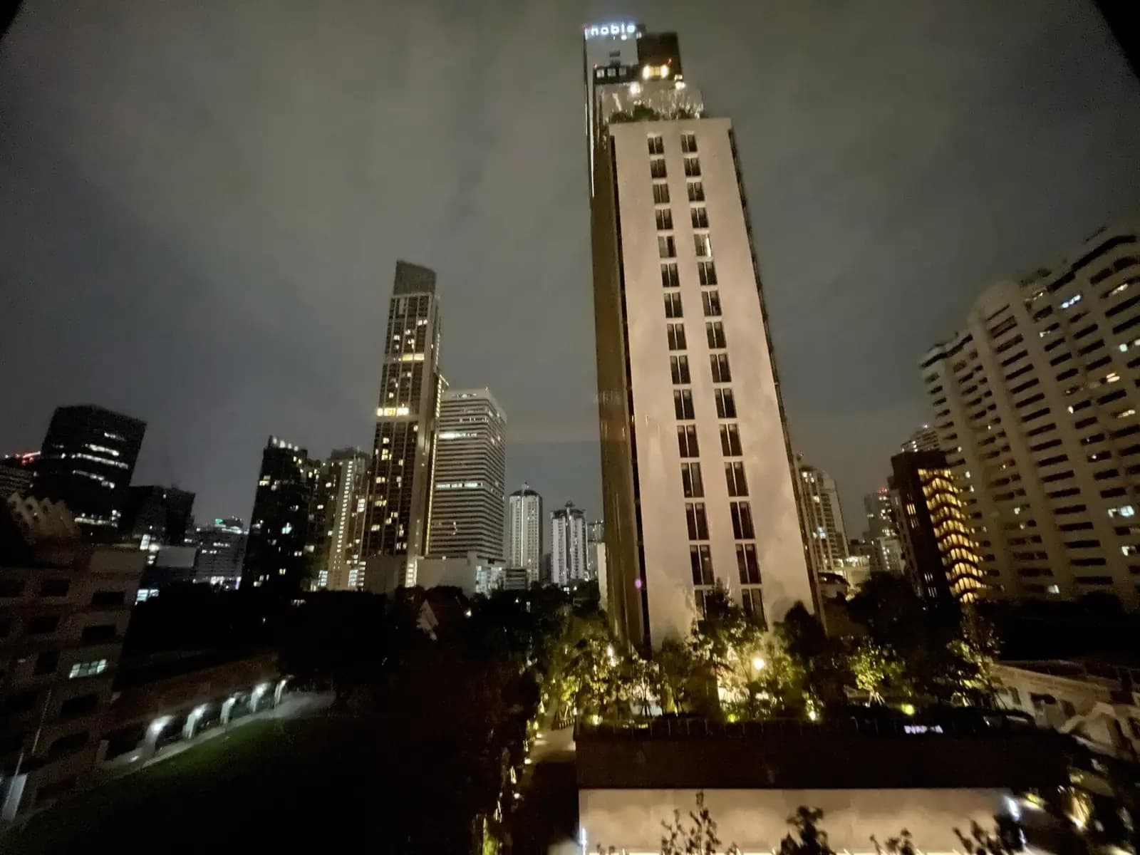 The lit high-rise skyline of Bangkok at night, Thailand