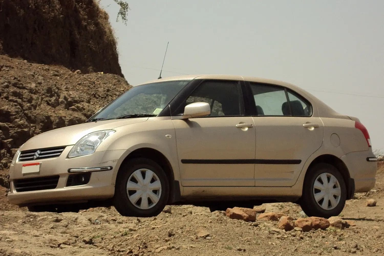 A Maruti Suzuki Dzire, the standard sedan on Indian intercity routes