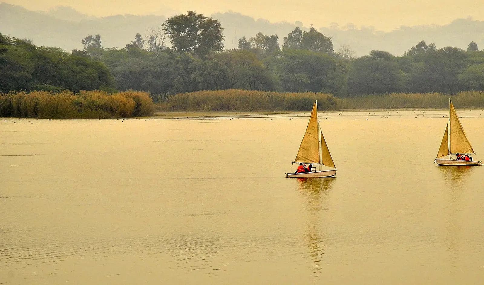 The promenade along Sukhna Lake in Chandigarh, where most Himachal road trips begin