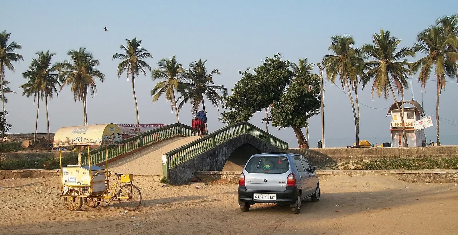 Fishing boats drawn up on the broad sand of Colva beach, South Goa