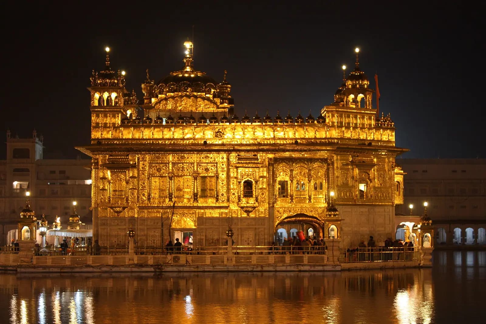 The gilded Harmandir Sahib standing in its sacred pool at Amritsar, Punjab