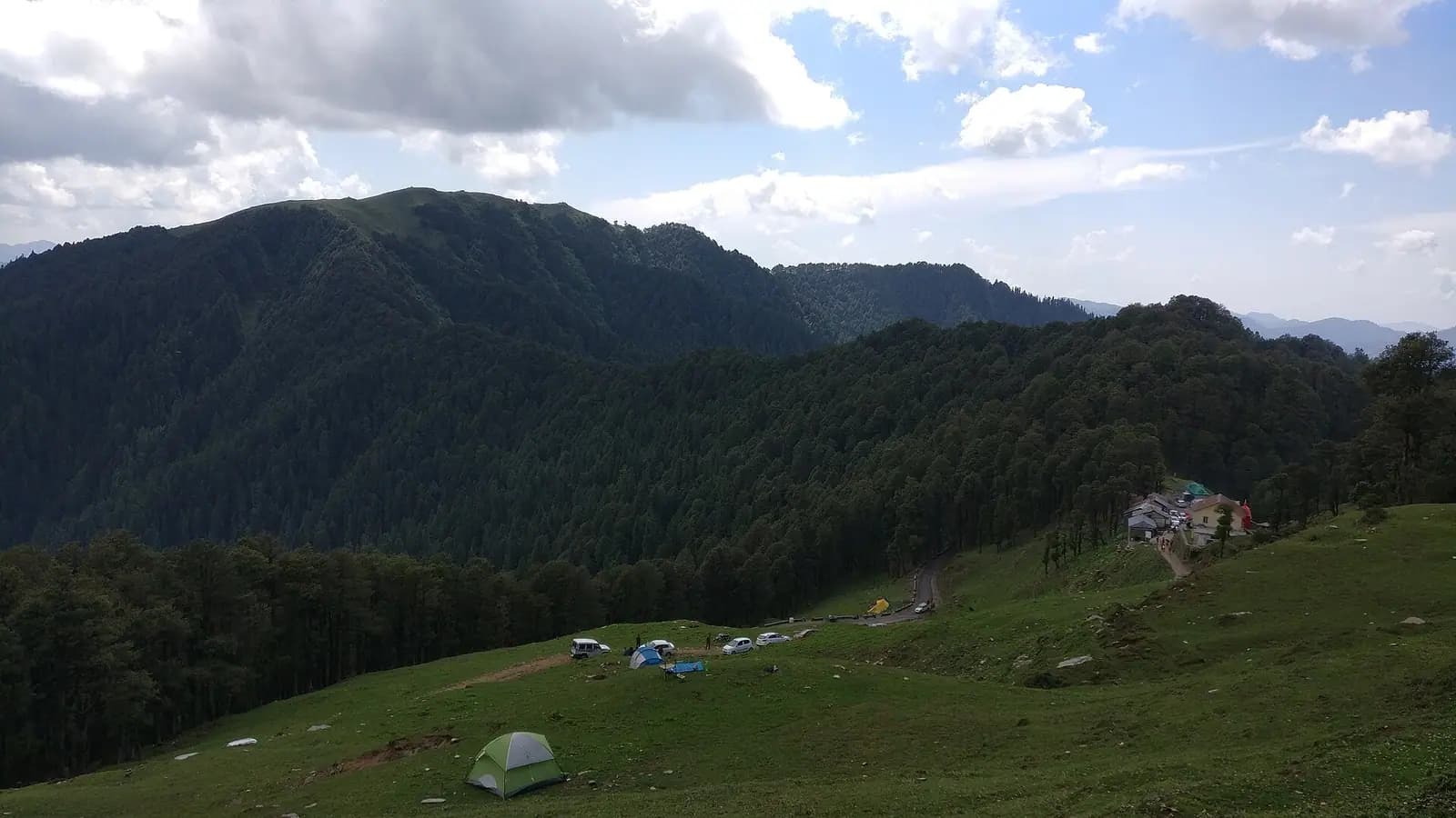 The road over Jalori Pass with oak forest on the ridges, Himachal Pradesh